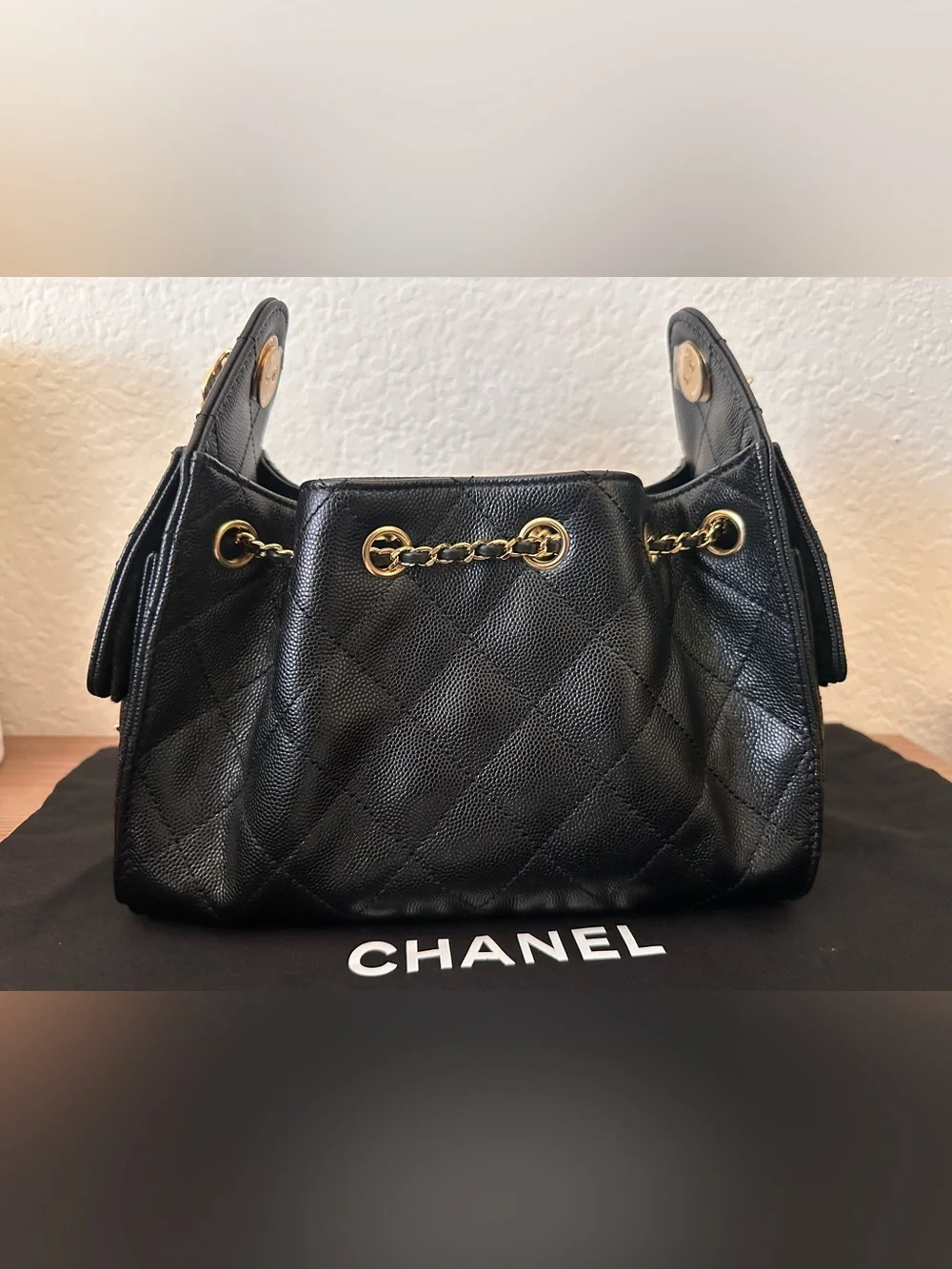 CHANEL 25 Mini Black Quilted Leather Drawstring Bucket Bag with Gold Hardware